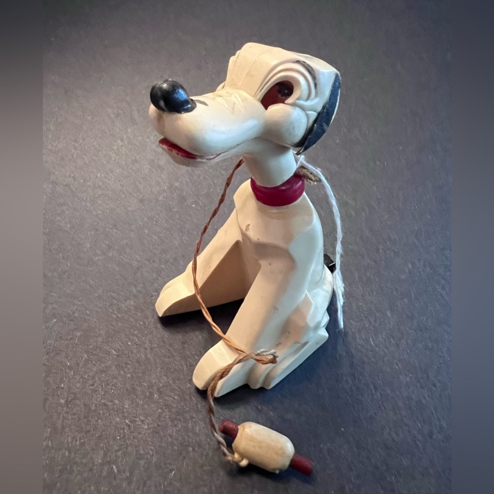 Vintage plastic Pluto dog with magnet bone prize by by: J.V.Z. Co.